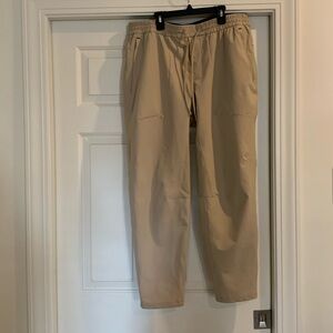 Lululemon khaki pull on pants with a drawstring waist.